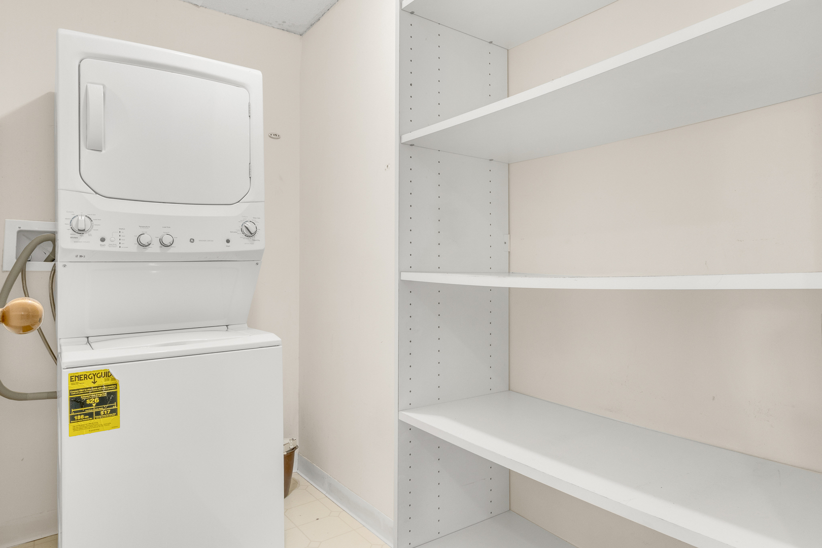 360 East Randolph Street, Unit 2307 Chicago, IL 60601 - Photo 20 of 34 a utility room with dryer and washer