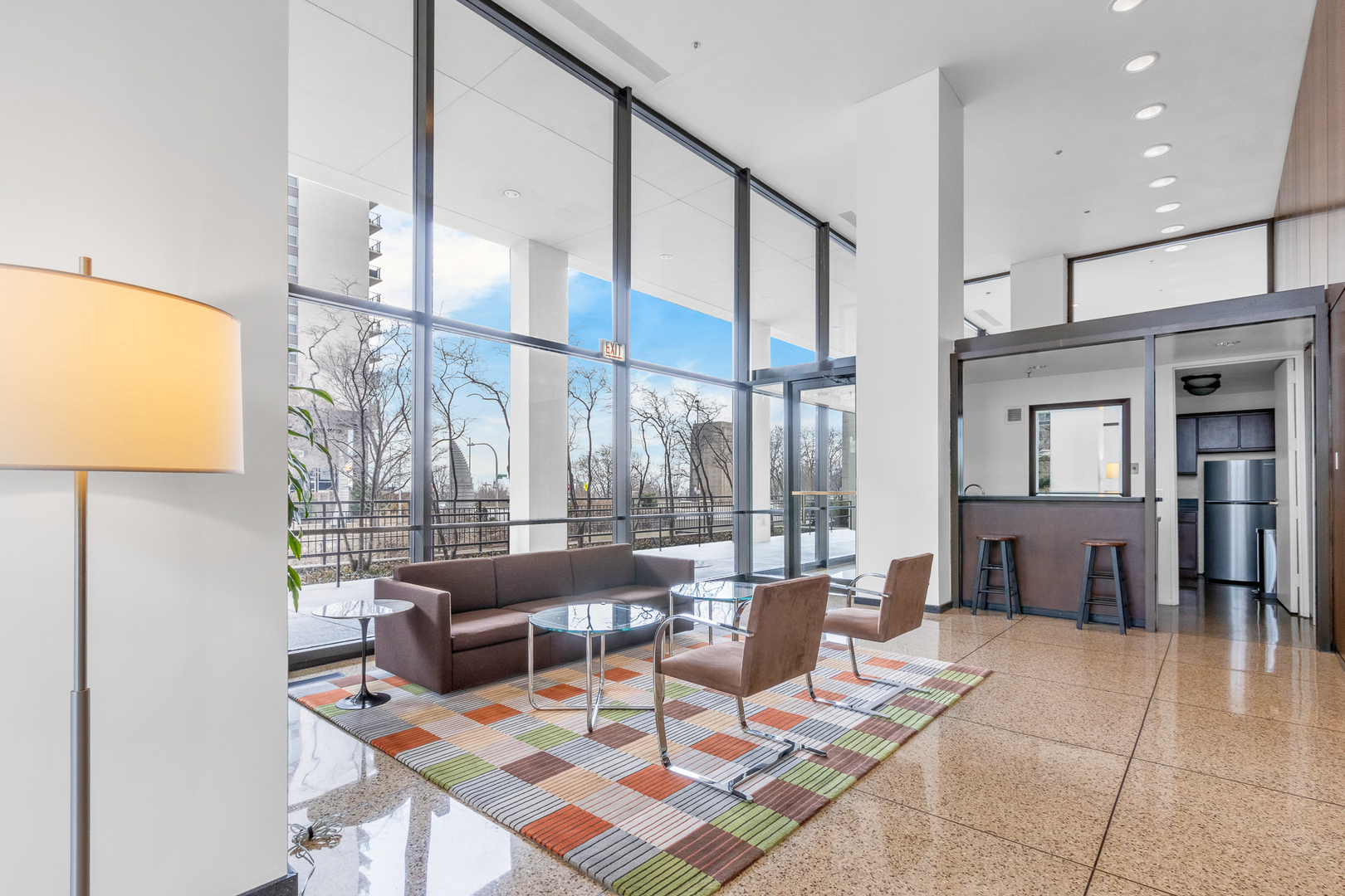 360 East Randolph Street, Unit 2307 Chicago, IL 60601 - Photo 23 of 34 a living room with fireplace furniture and a large window