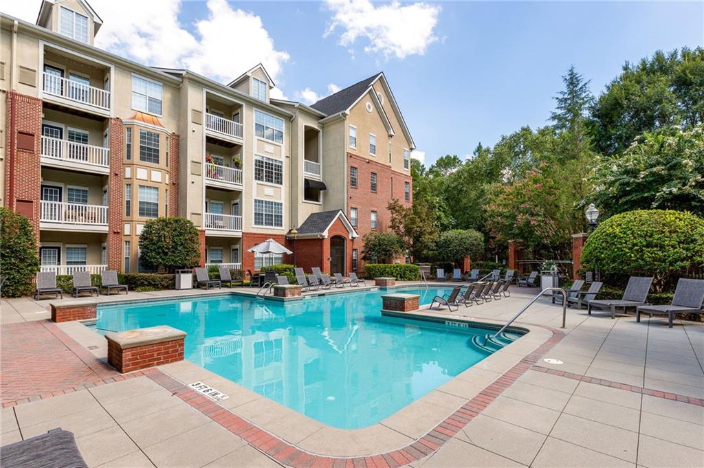 4203 Westchester Ridge Northeast Atlanta, GA 30329 - Photo 1 of 1 a view of swimming pool with outdoor seating
