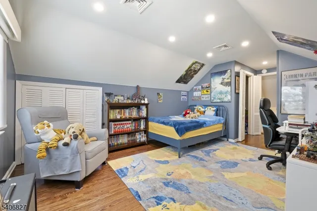 a bedroom with furniture and a bed