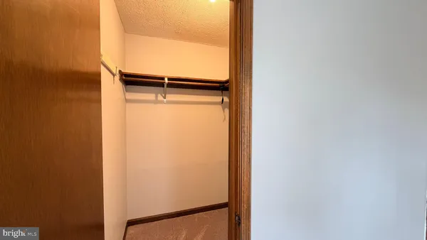 a view of a door and a window