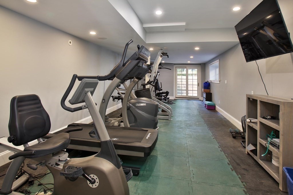43 Carlton Road Newton, MA 02468 - Photo 18 of 23 a gym hall with exercise machine