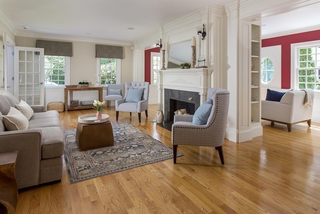 43 Carlton Road Newton, MA 02468 - Photo 3 of 23 a living room with furniture and a fireplace