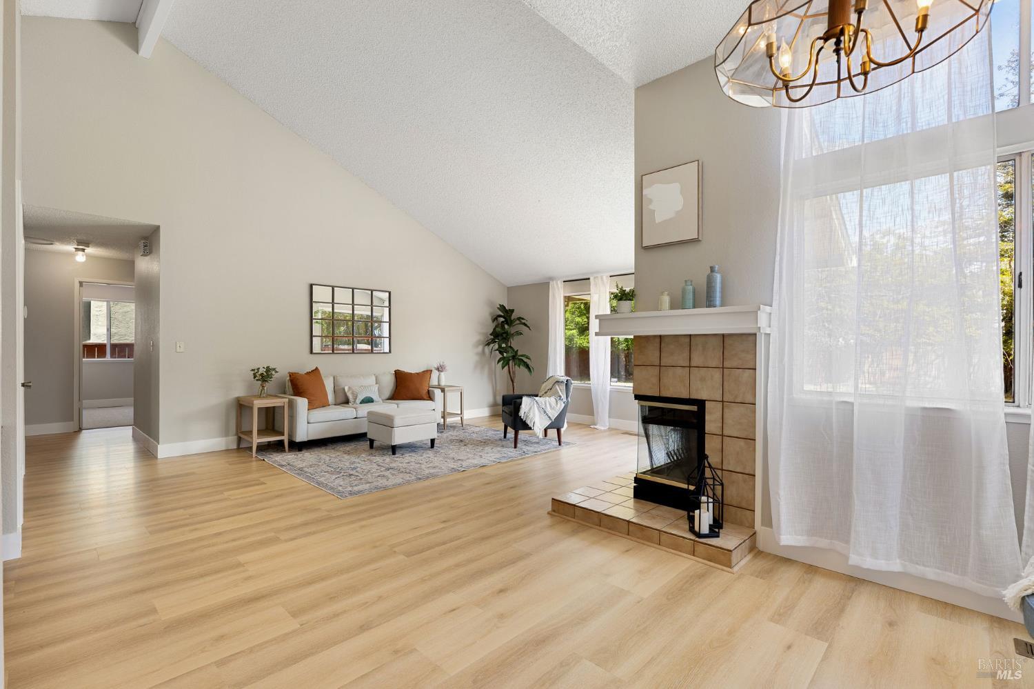 828 Stoneridge Circle Fairfield, CA 94534 - Photo 18 of 37 a living room with furniture and a fireplace