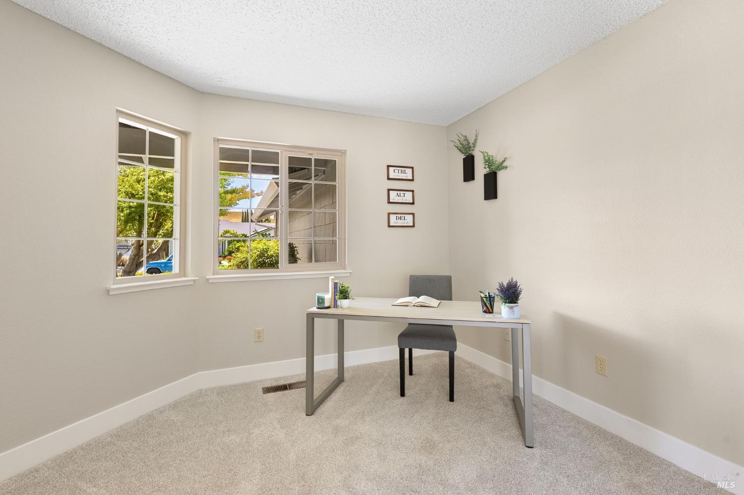 828 Stoneridge Circle Fairfield, CA 94534 - Photo 19 of 37 a view of a workspace with furniture and a window