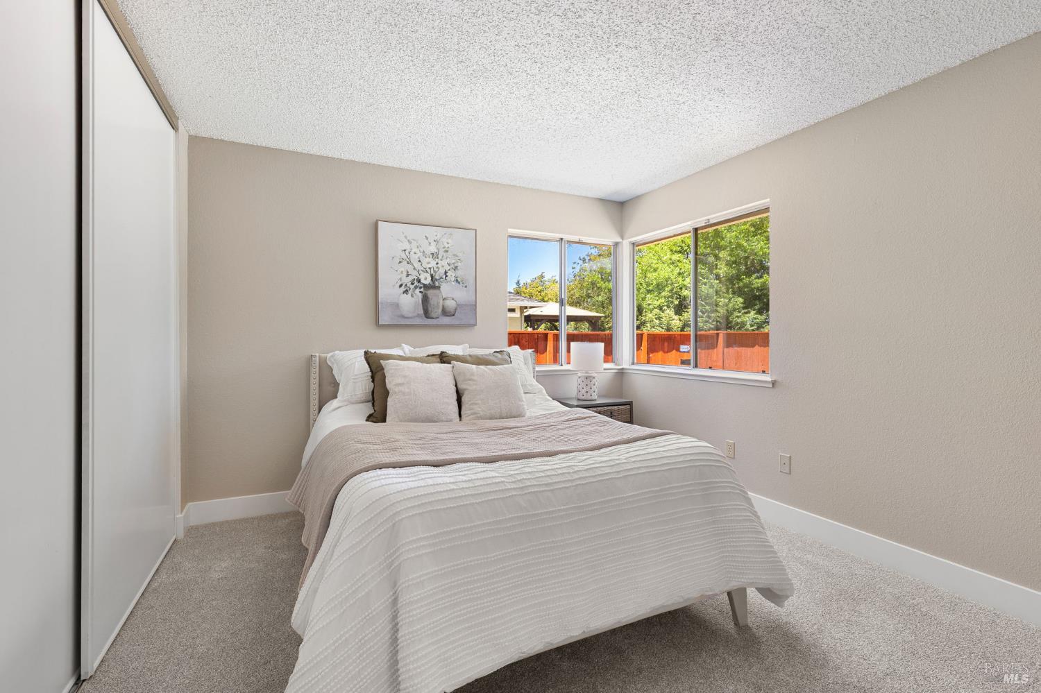 828 Stoneridge Circle Fairfield, CA 94534 - Photo 29 of 37 a bedroom with a bed and a window