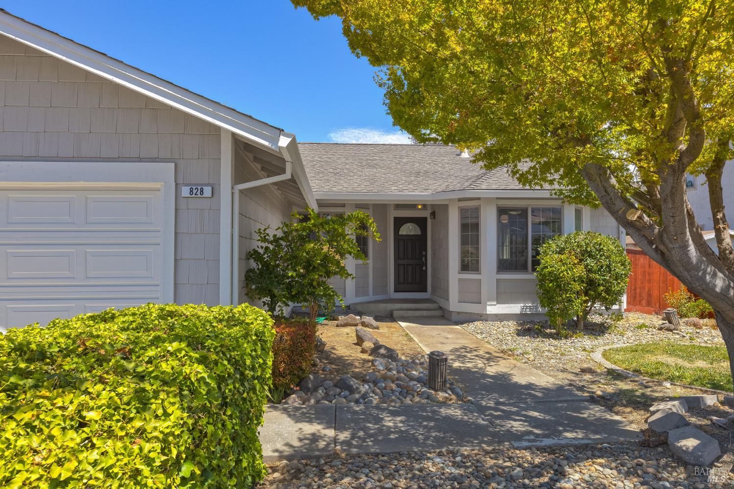 828 Stoneridge Circle Fairfield, CA 94534 - Photo 3 of 37 a view of a house with a small yard and potted plants