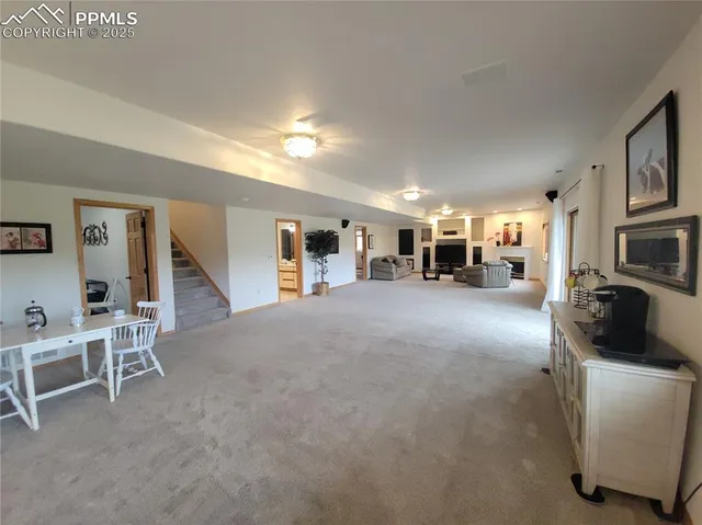a view of a livingroom with furniture and a couch