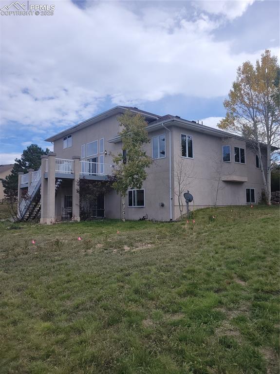 730 Winding Hills Road Monument, CO 80132 - Photo 37 of 42 a backyard of a house
