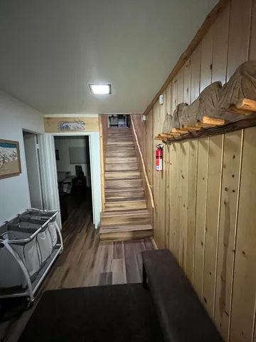 a view of entryway with wooden floor