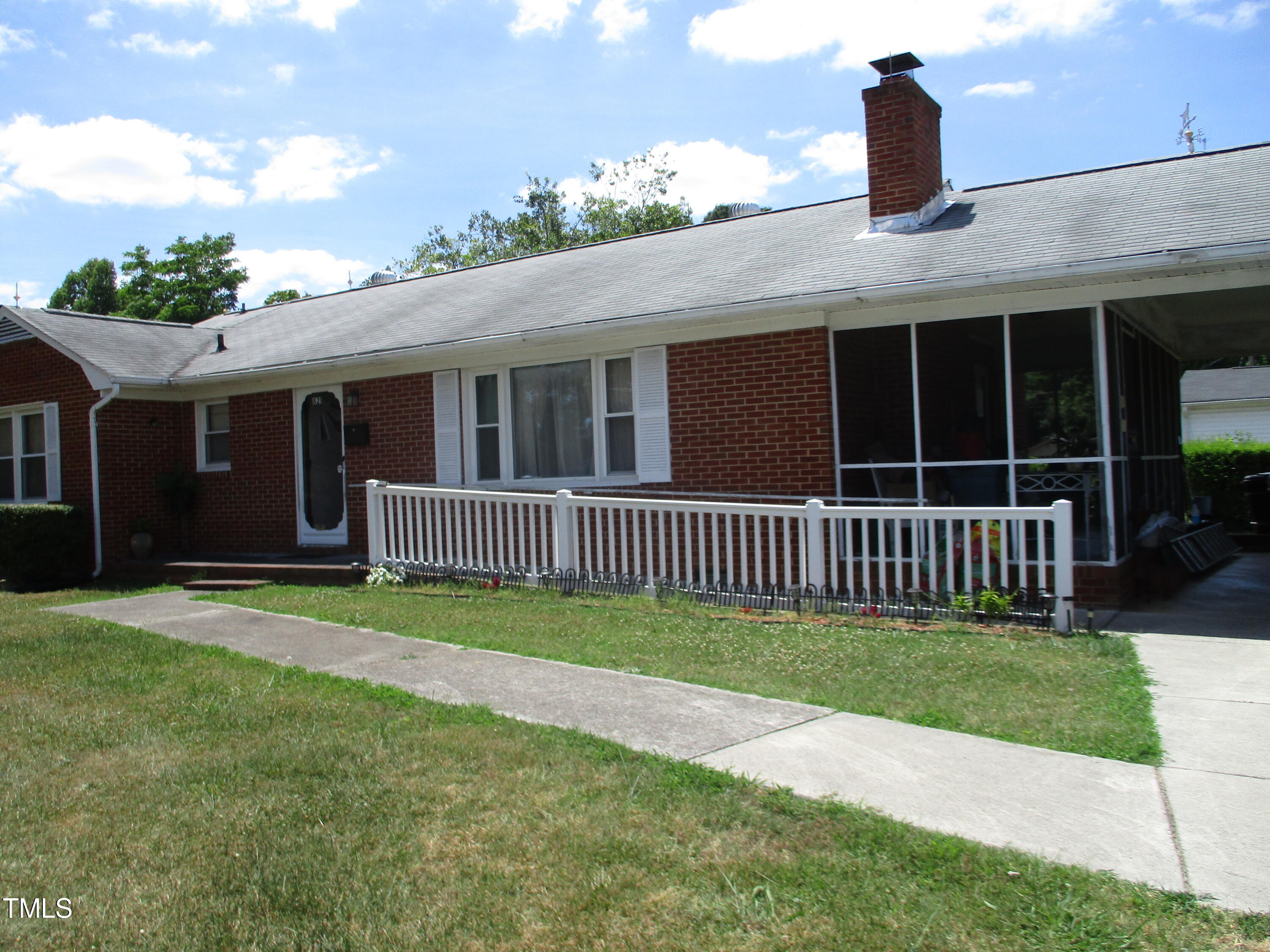 821 South Main Street Roxboro, NC 27573 - Photo 1 of 9 a view of a house with a yard