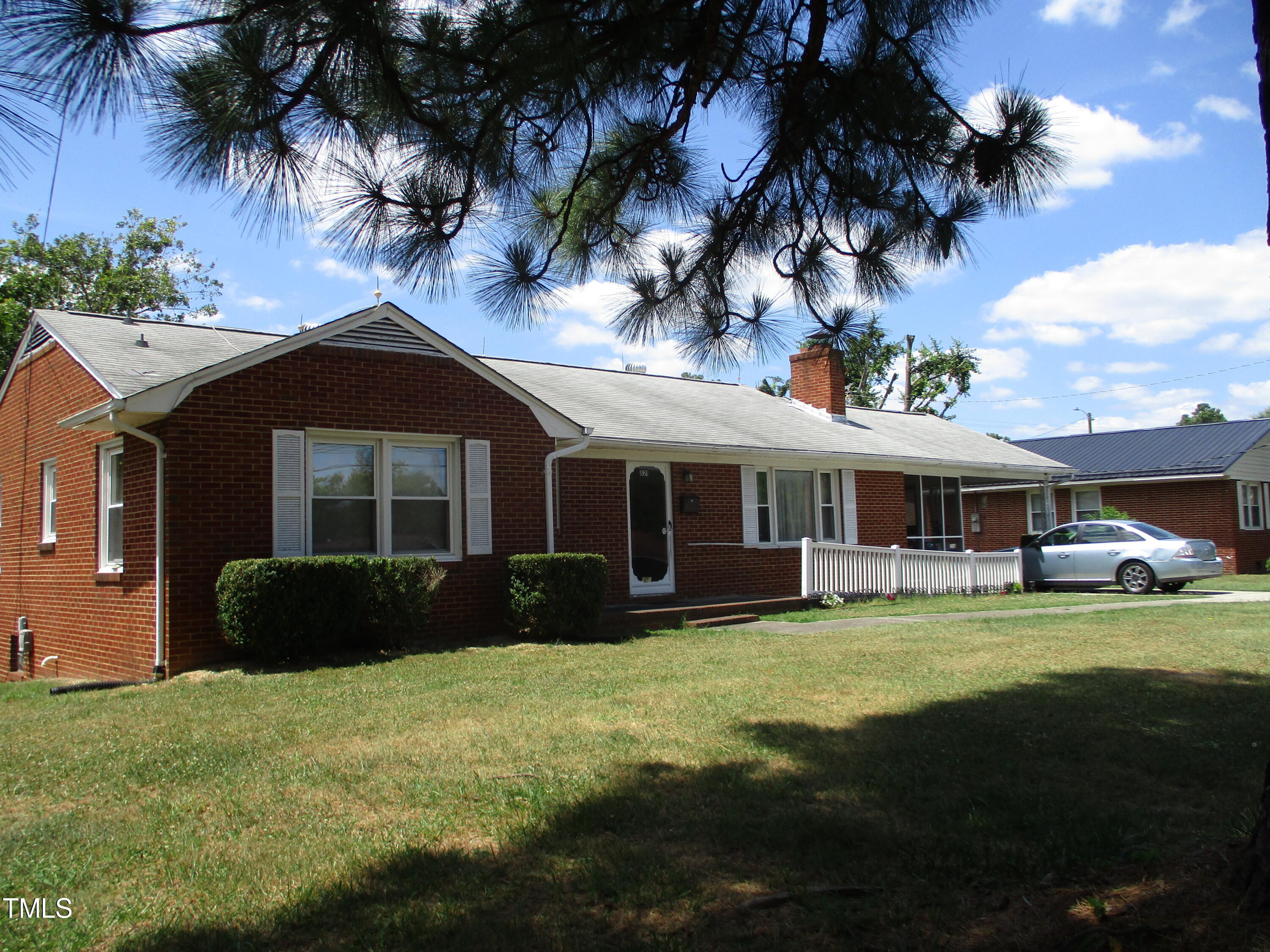 821 South Main Street Roxboro, NC 27573 - Photo 3 of 9 a front view of a house with garden
