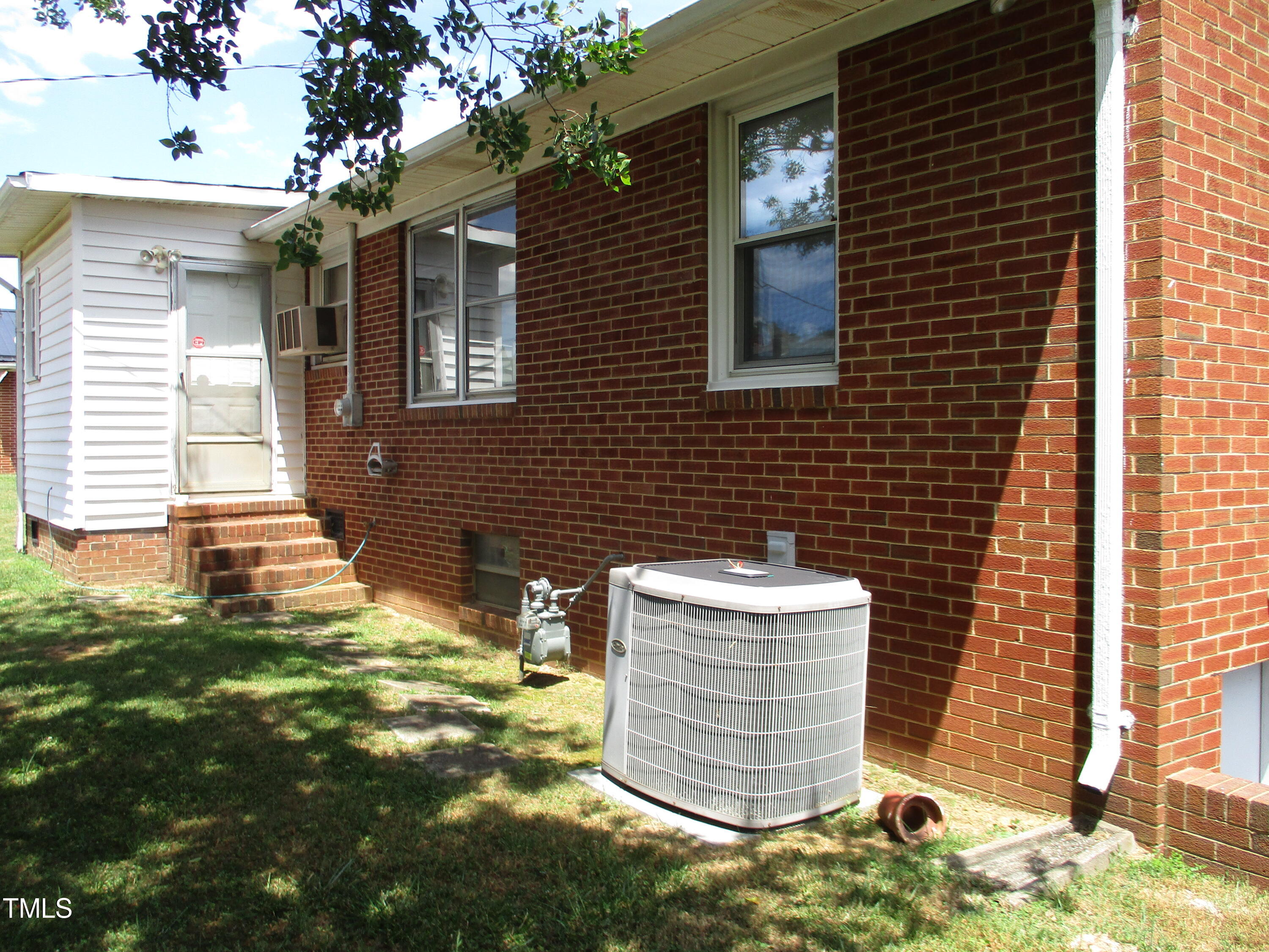 821 South Main Street Roxboro, NC 27573 - Photo 5 of 9 a view of house with backyard