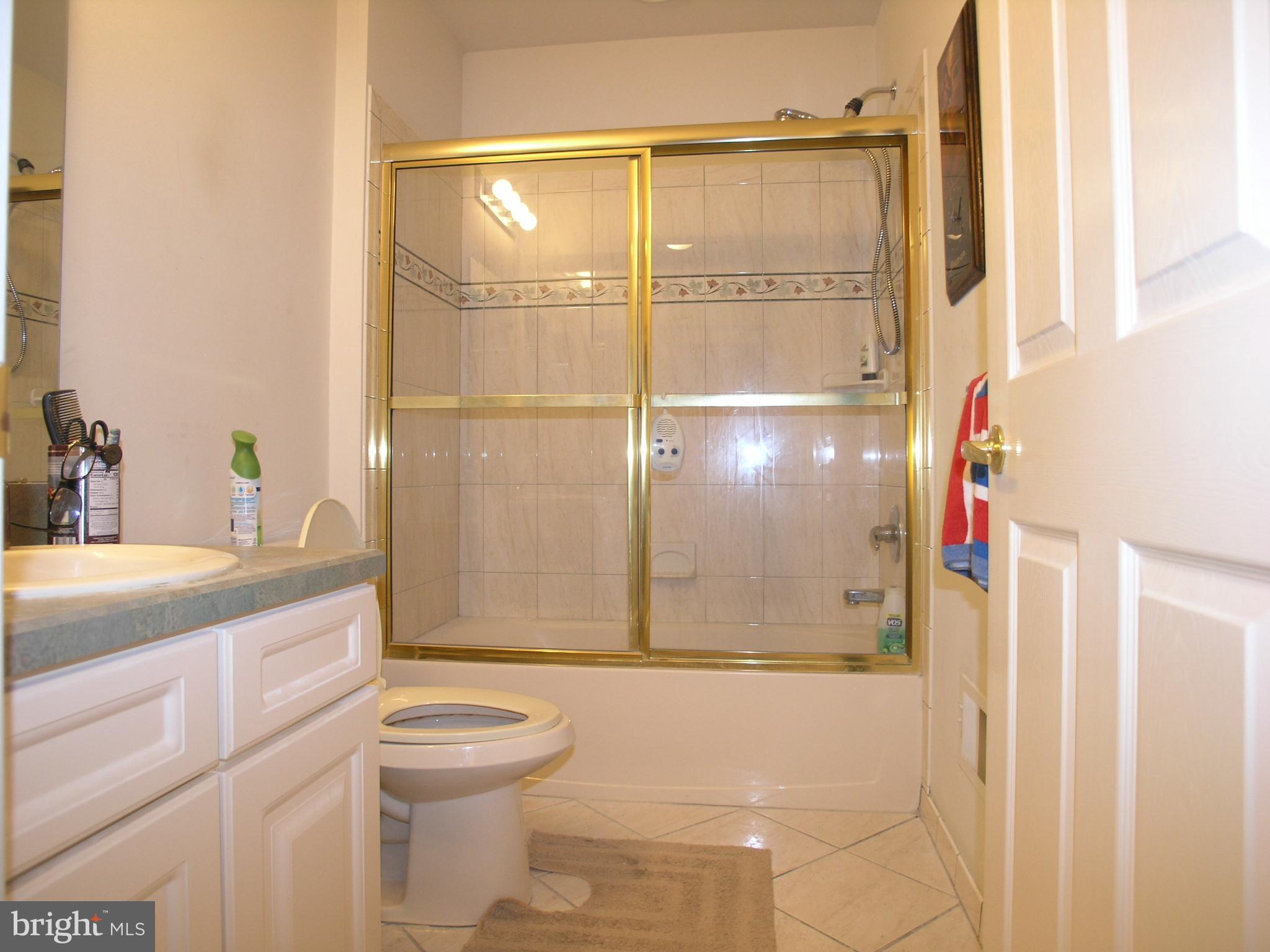 950 Nathaniel Trail Warminster, PA 18974 - Photo 20 of 26 a bathroom with a granite countertop sink toilet and shower