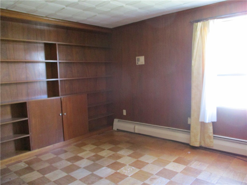 67 Landmark Road Warwick, RI 02886 - Photo 11 of 20 1st Floor Study/Office with Parcade Flooring
