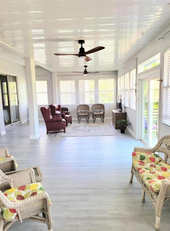 1415 Beach Club Lane Apollo Beach, FL 33572 - Photo 18 of 20 a living room with furniture and large windows