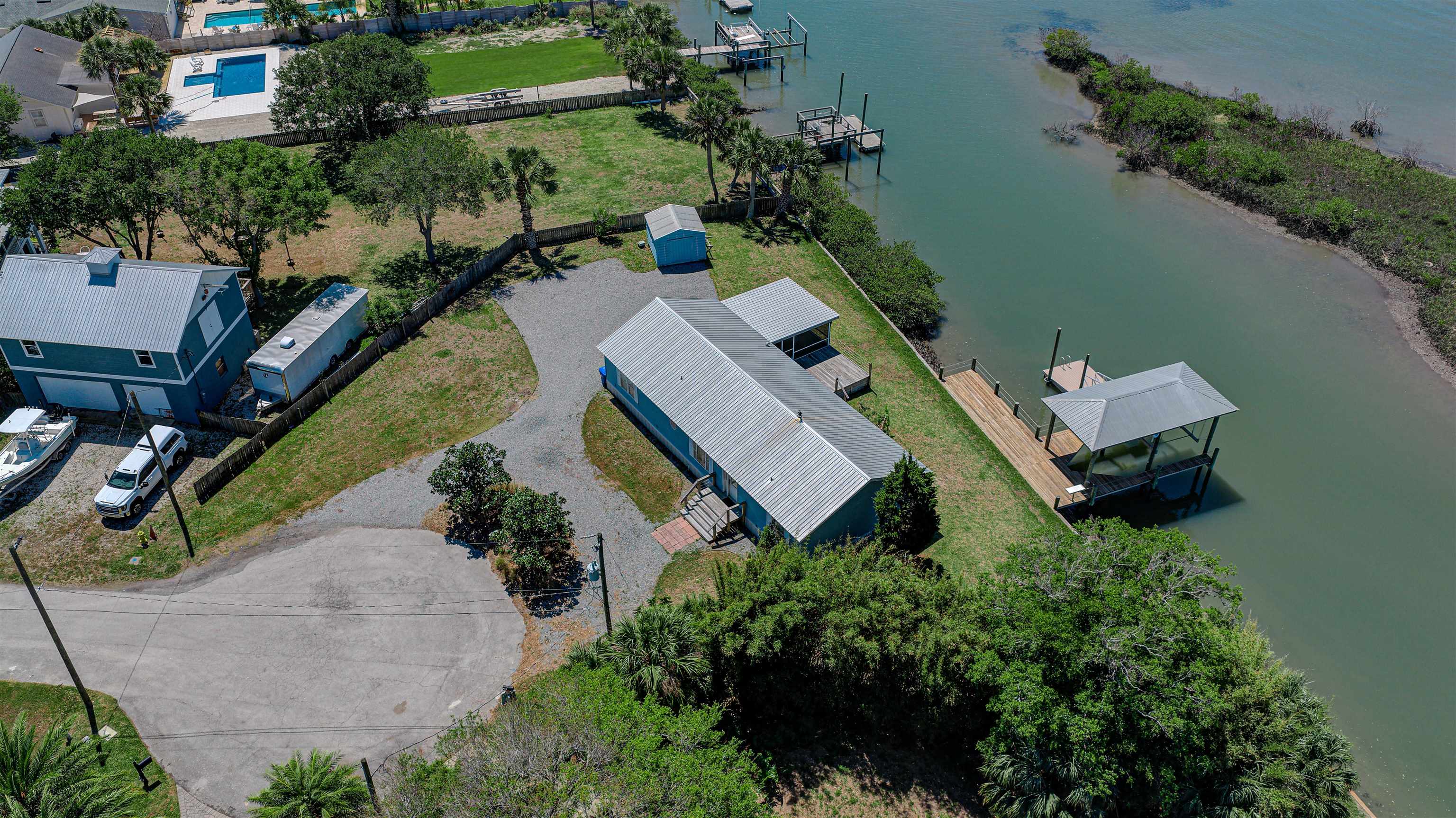 6347 Salado Road St. Augustine, FL 32080 - Photo 20 of 40 an aerial view of a house with outdoor space and lake view