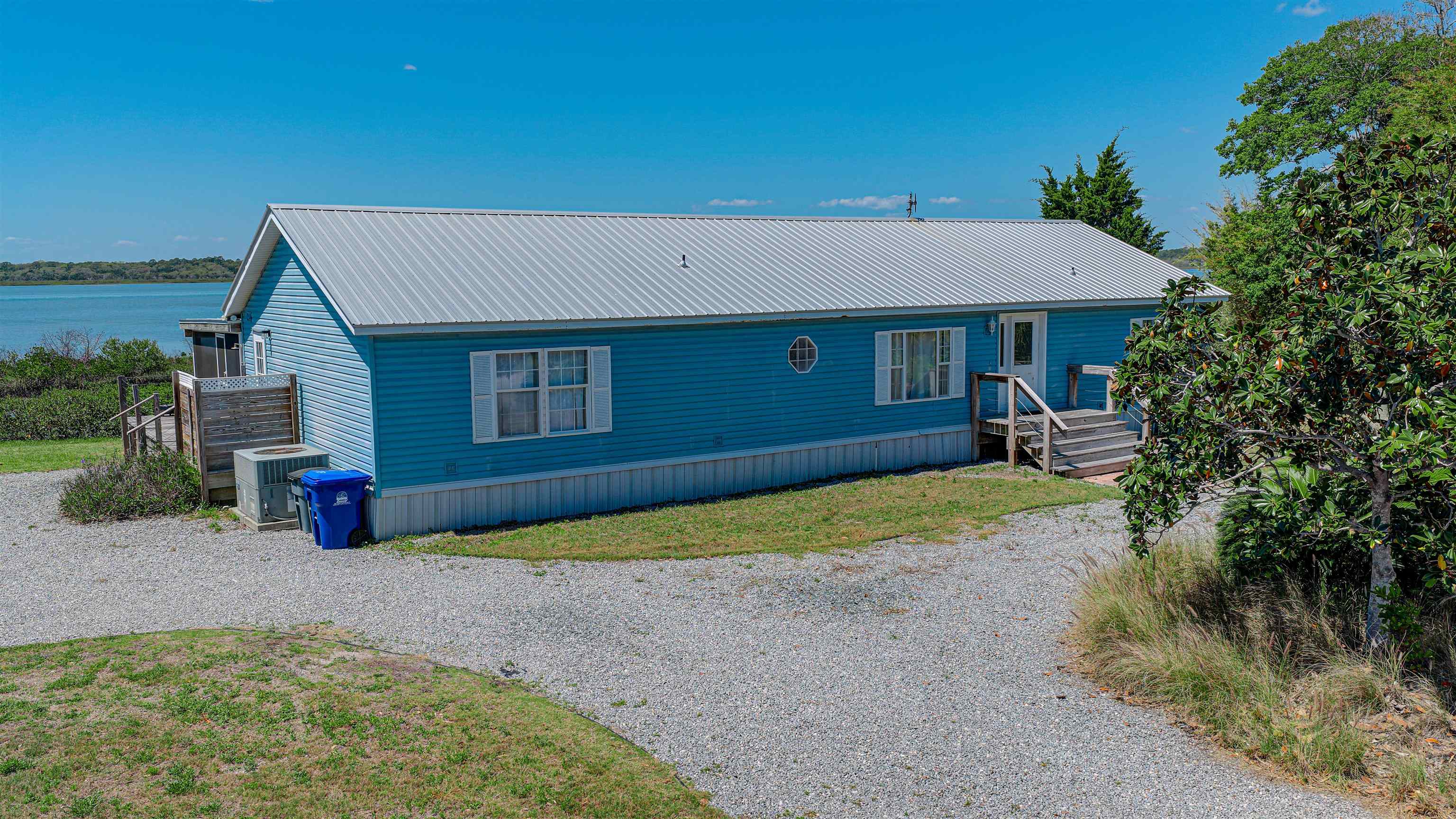 6347 Salado Road St. Augustine, FL 32080 - Photo 23 of 40 a front view of a house with a yard