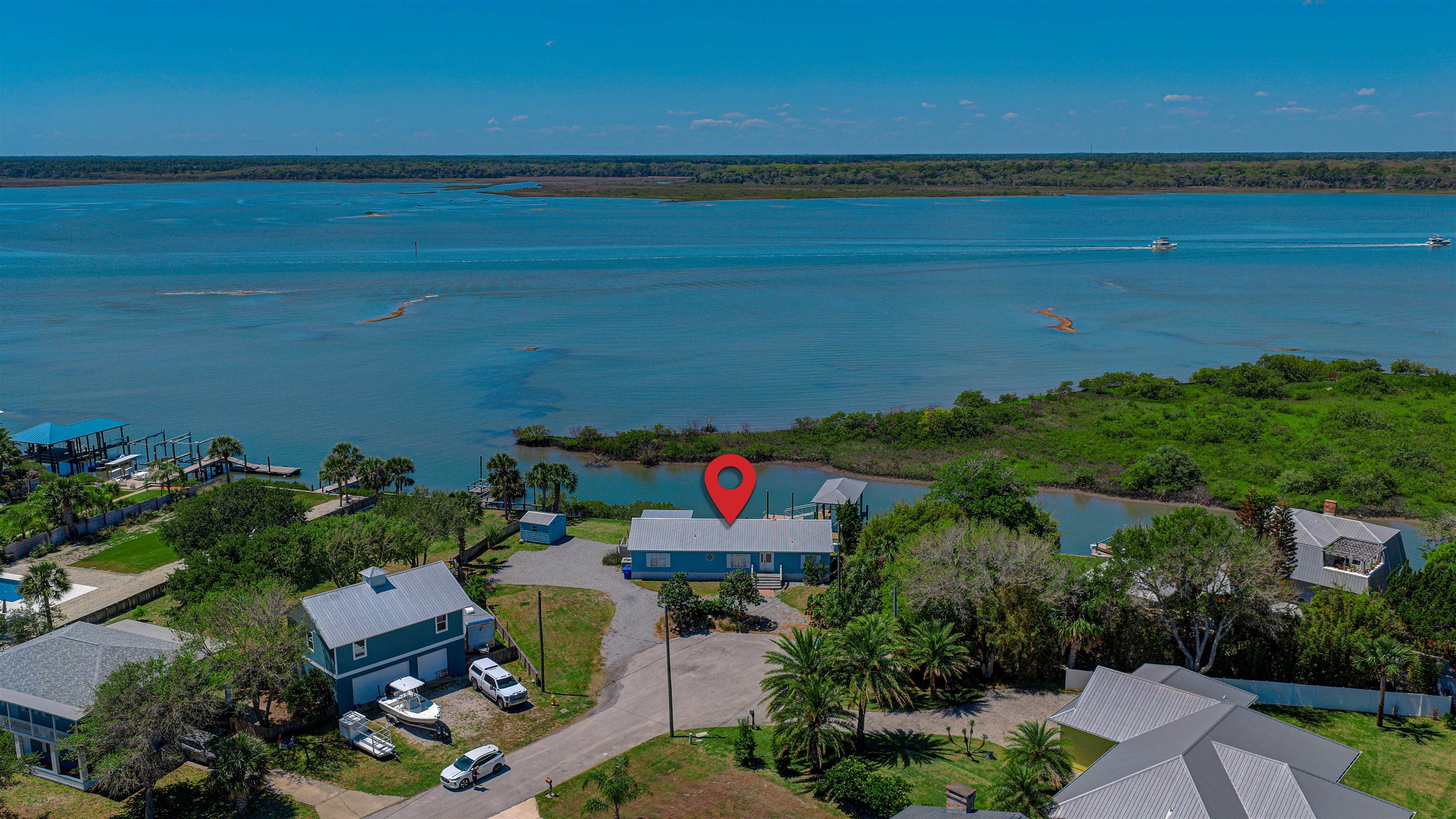 6347 Salado Road St. Augustine, FL 32080 - Photo 24 of 40 an aerial view of a house with a lake view