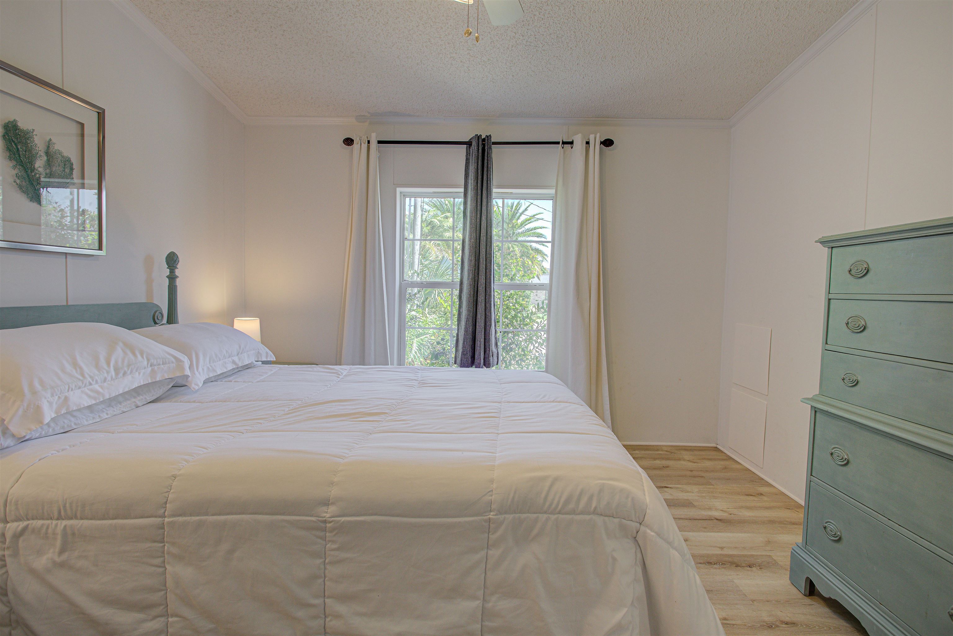 6347 Salado Road St. Augustine, FL 32080 - Photo 31 of 40 a bedroom with a bed and a window
