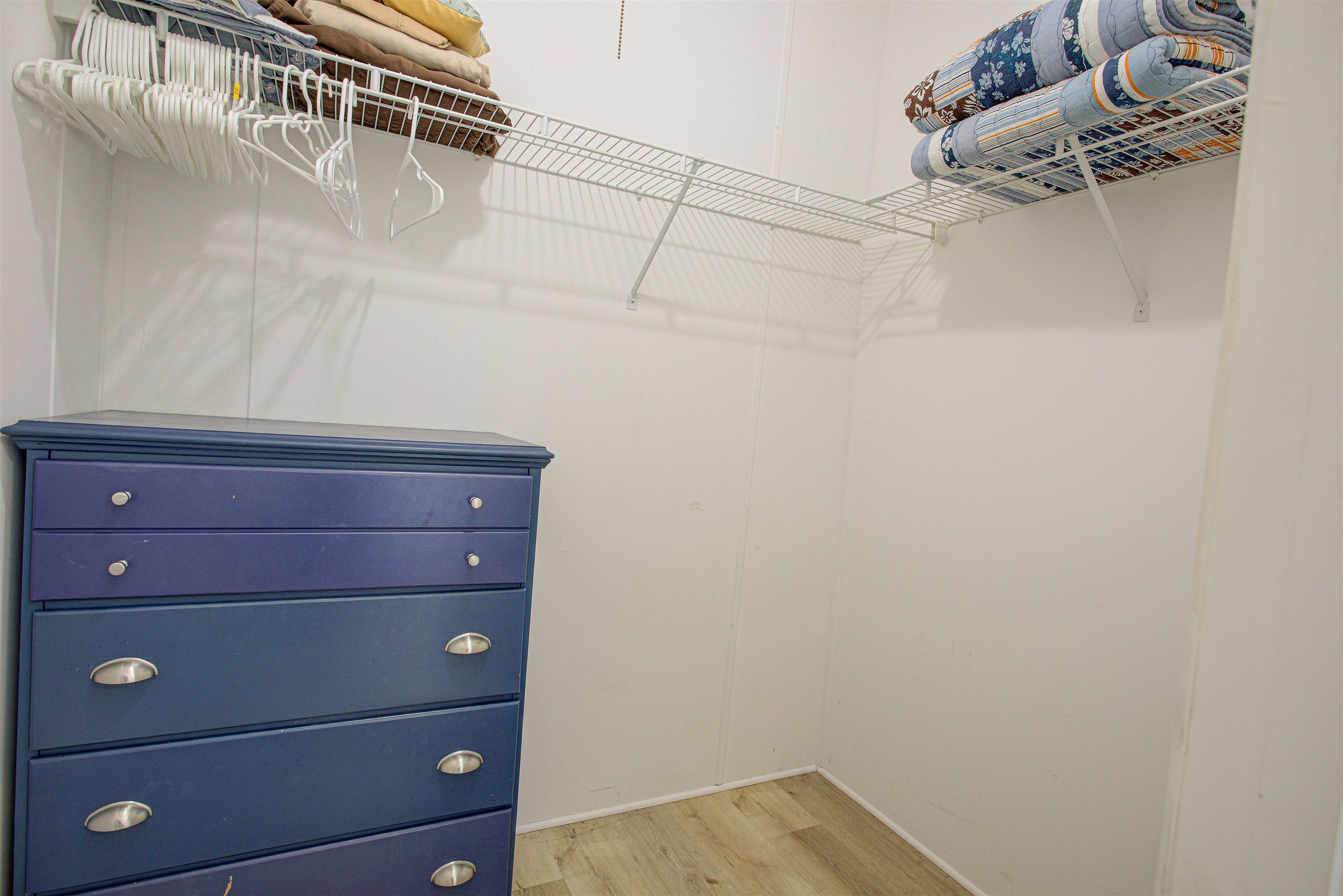 6347 Salado Road St. Augustine, FL 32080 - Photo 35 of 40 a view of a store room with cabinets