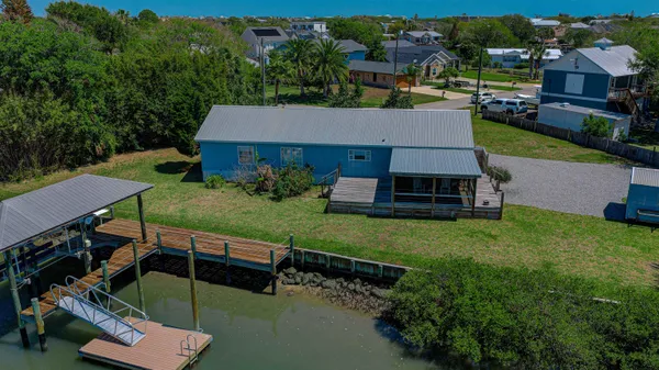 an aerial view of a house with garden