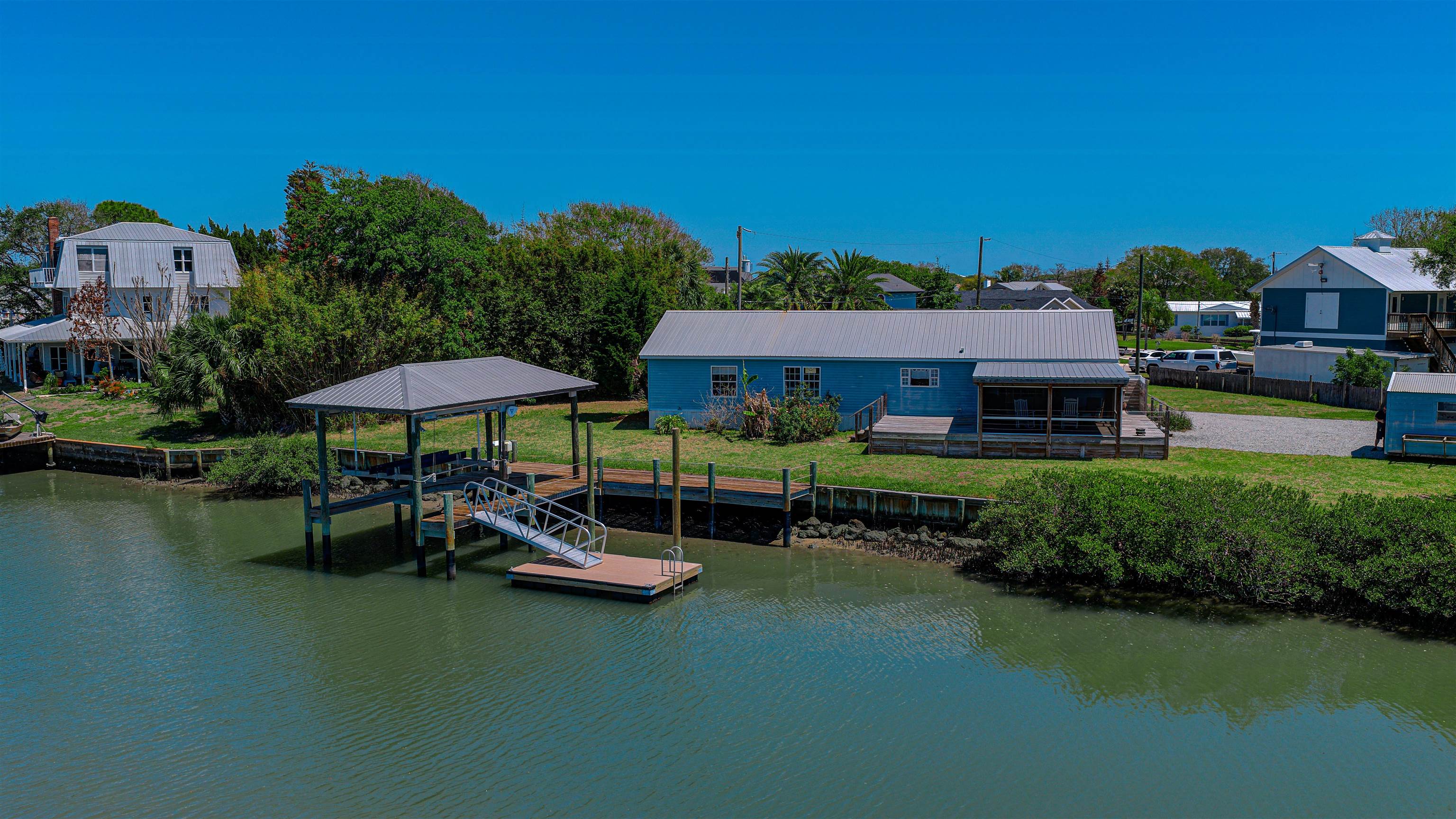 6347 Salado Road St. Augustine, FL 32080 - Photo 40 of 40 a swimming pool with outdoor seating and yard