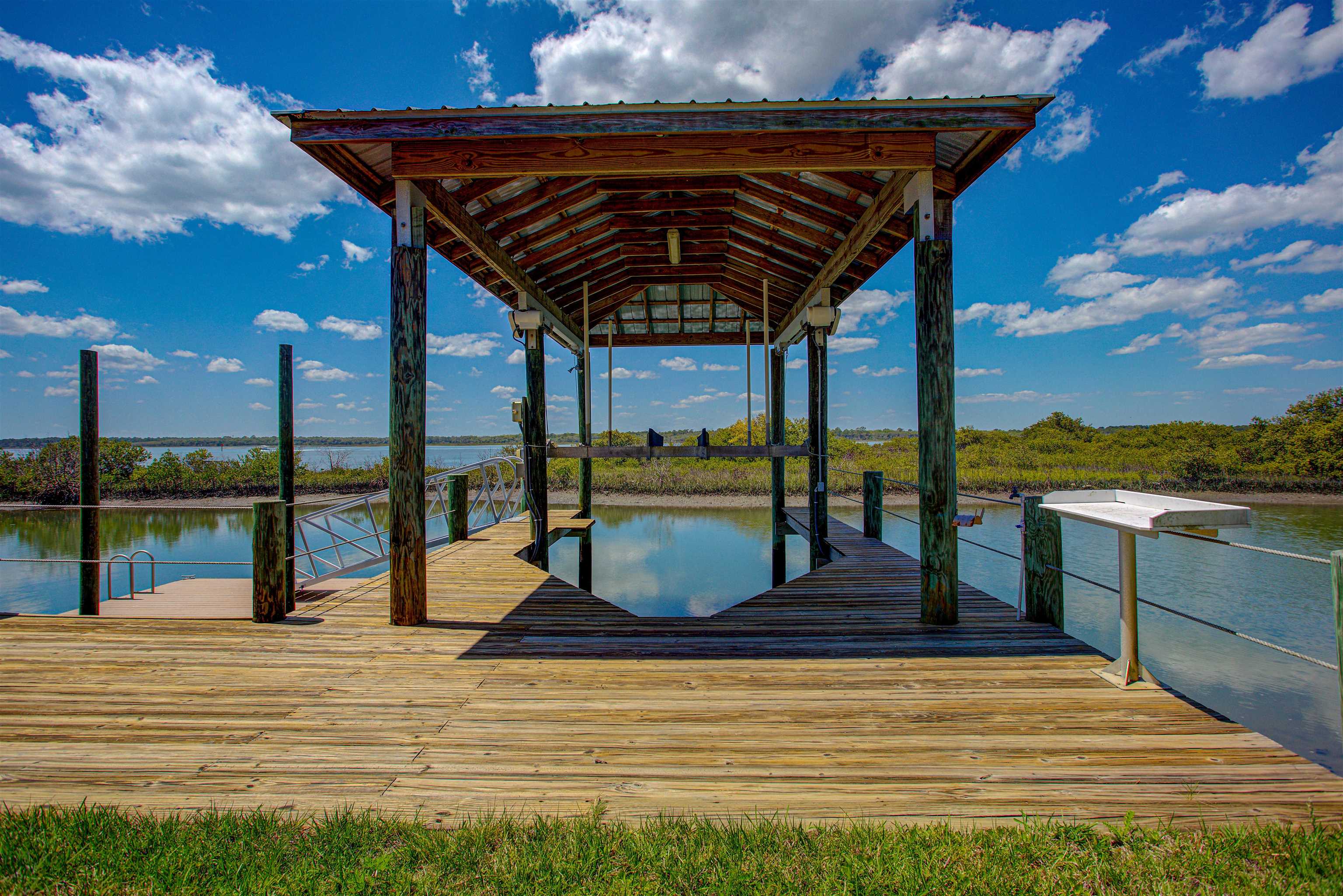 6347 Salado Road St. Augustine, FL 32080 - Photo 6 of 40 a view of a terrace with wooden floor