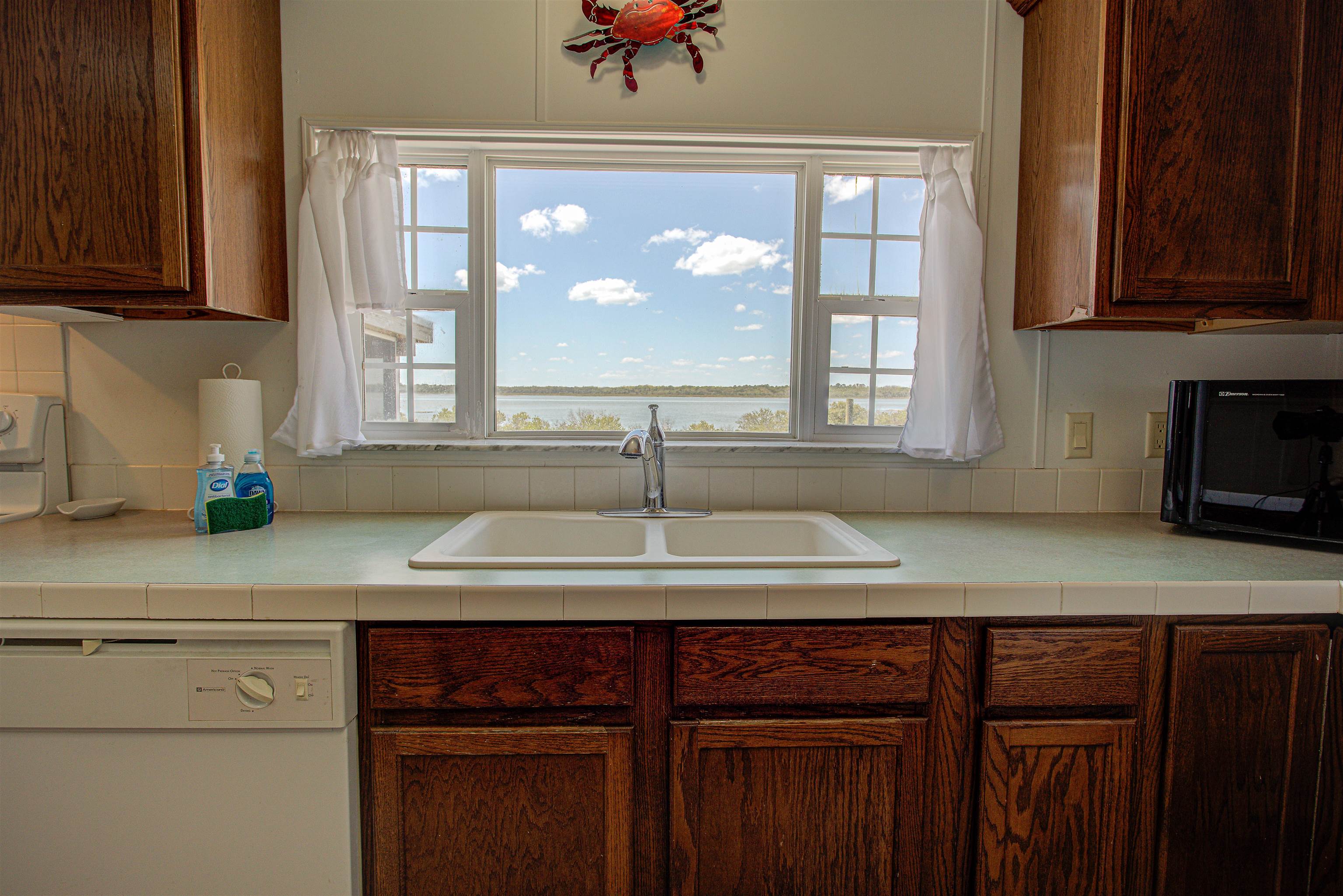 6347 Salado Road St. Augustine, FL 32080 - Photo 7 of 40 a kitchen with a sink cabinets and a window