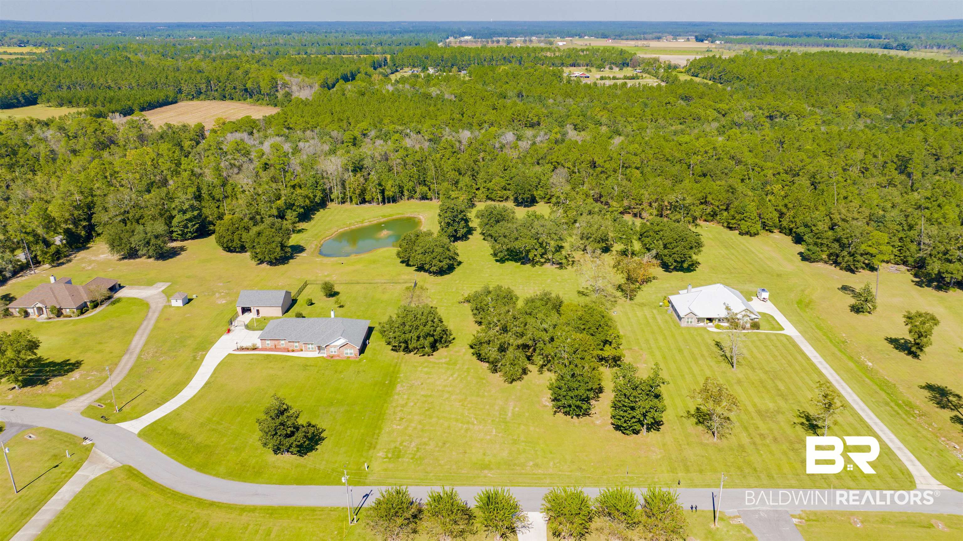 0 Chatelaine Road Elberta, AL 36530 - Photo 1 of 10 Drone / aerial view of a large body of water and a heavily wooded area