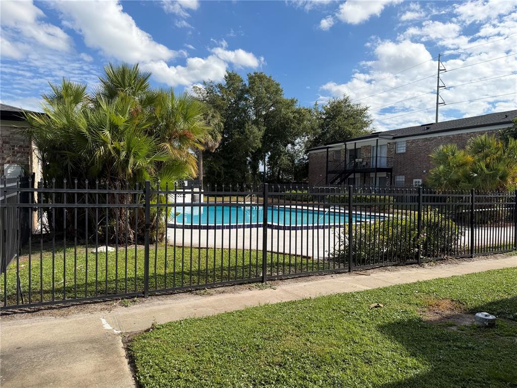 5317 Curry Ford Road, Unit P104 Orlando, FL 32812 - Photo 9 of 9 a view of a backyard