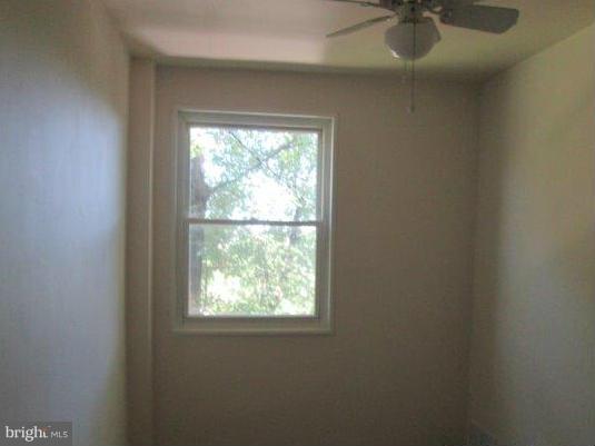 5430 Channing Road Baltimore, MD 21229 - Photo 11 of 13 an empty room with a window