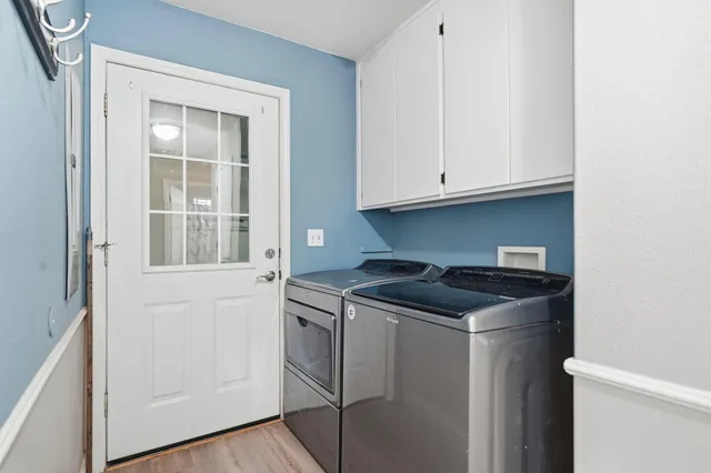 a backyard of a building with lots of green space and mountain view