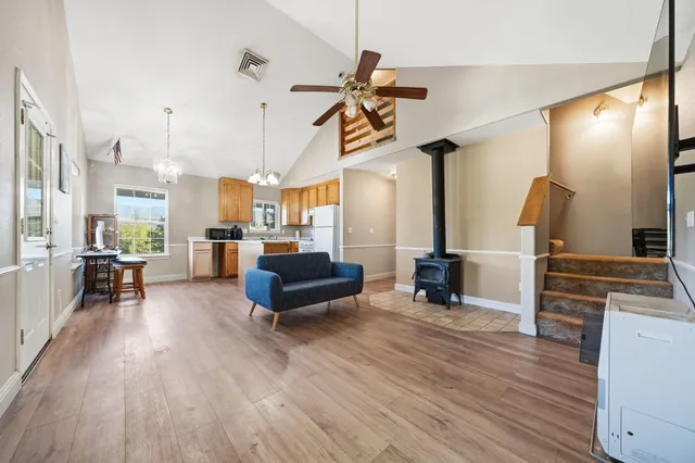 a view of a hallway with seating area