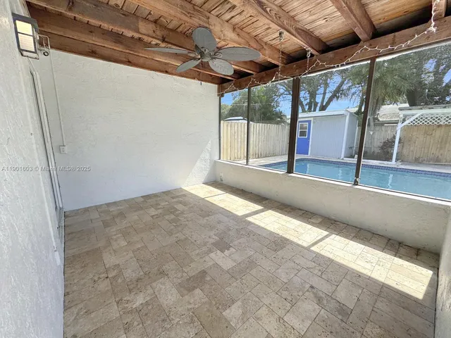 a view of an empty room with a balcony