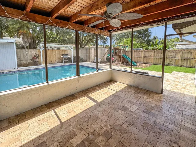 a view of a backyard of a house