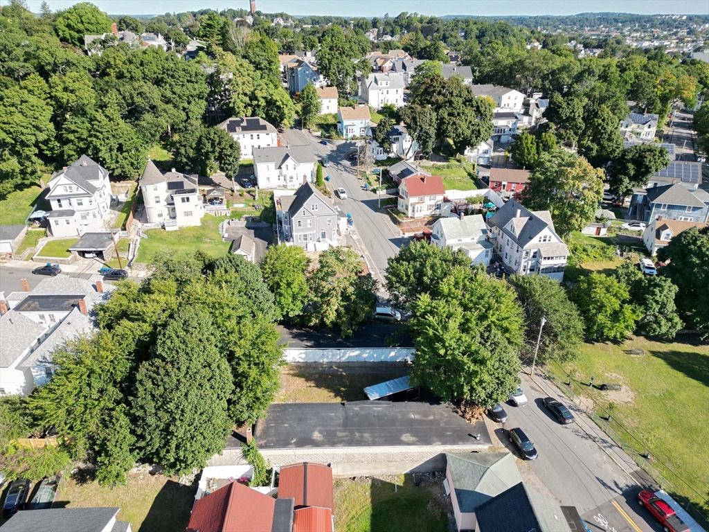 0 Hudson Lawrence, MA 01841 - Photo 5 of 20 an aerial view of residential houses with outdoor space and trees all around