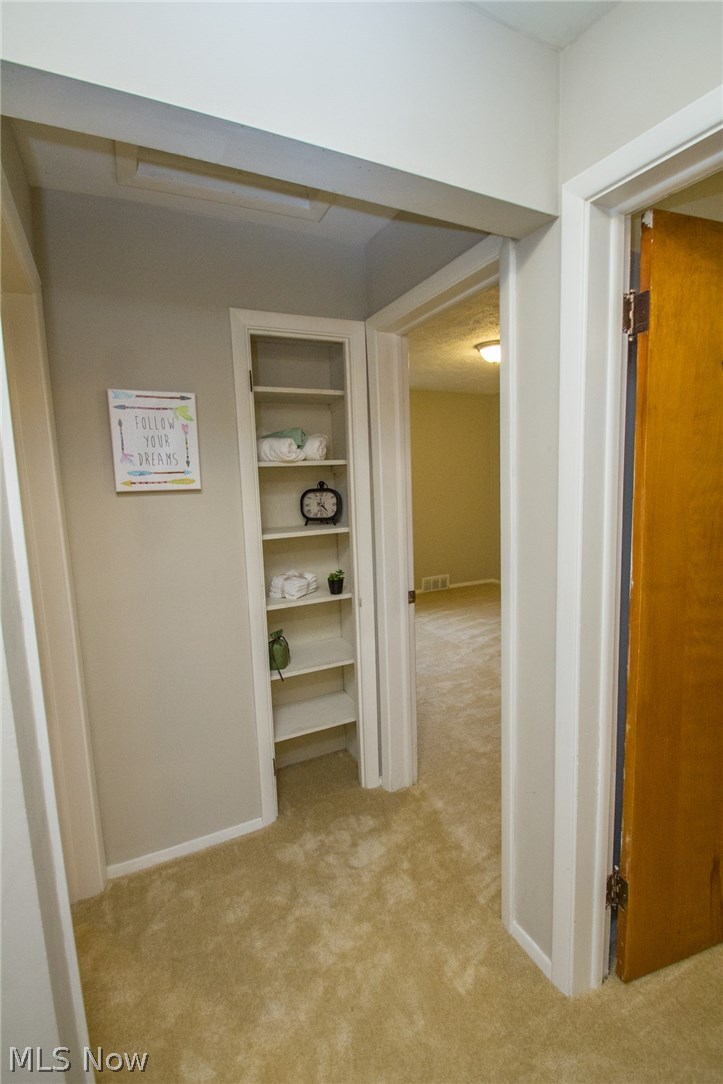 10571 Snow Road Parma Heights, OH 44130 - Photo 11 of 25 Bedroom hallway