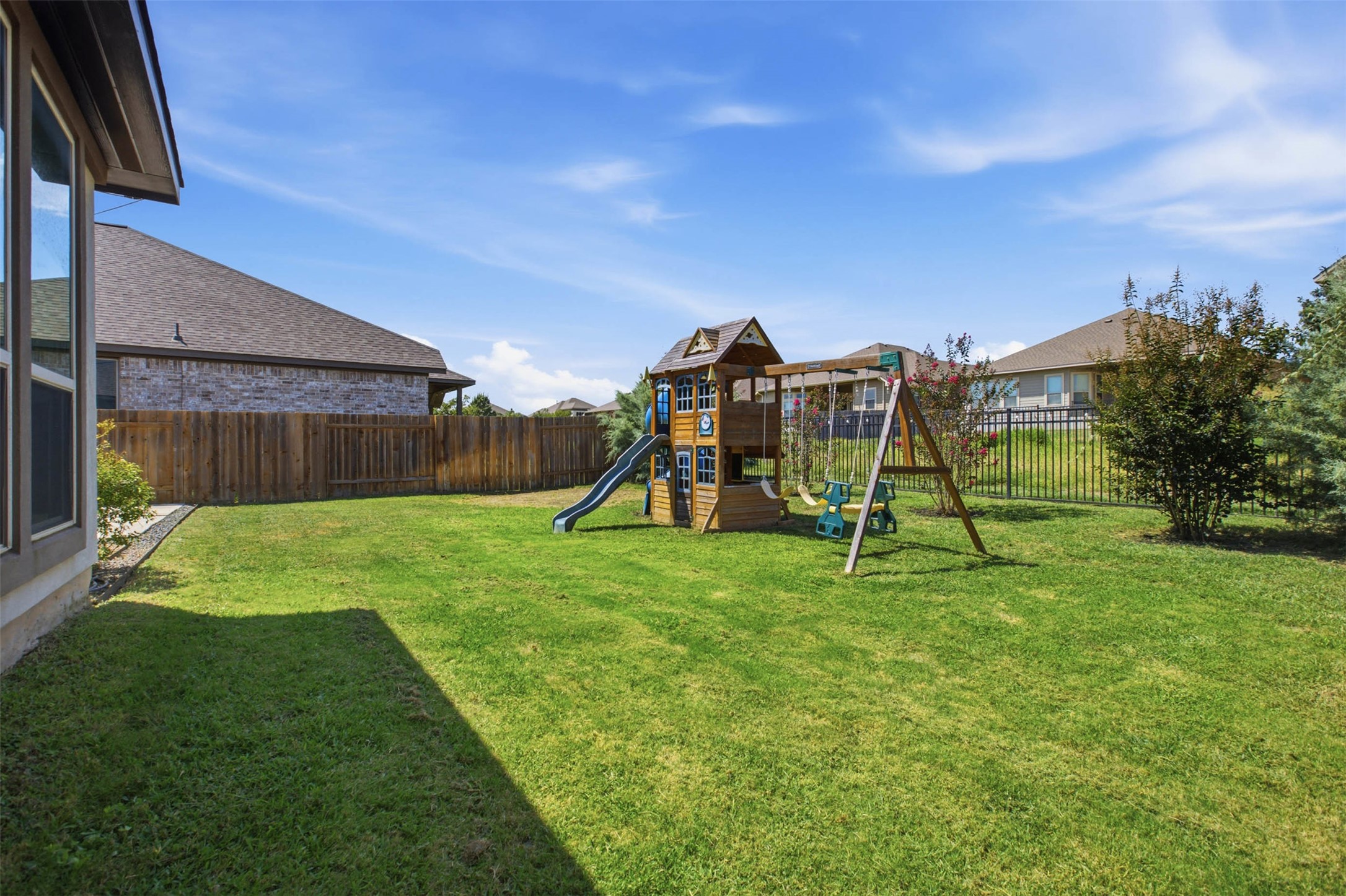 3101 Rabbit Creek Drive Georgetown, TX 78626 - Photo 26 of 38 A well-maintained green lawn offers ample space for recreation, complete with a charming playset. The Play Scape conveys with the property.