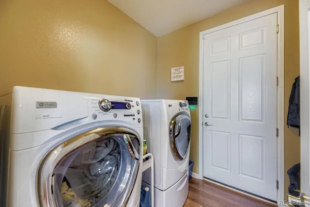 a utility room with dryer and washer