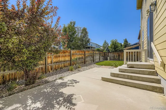 a view of pathway with yard