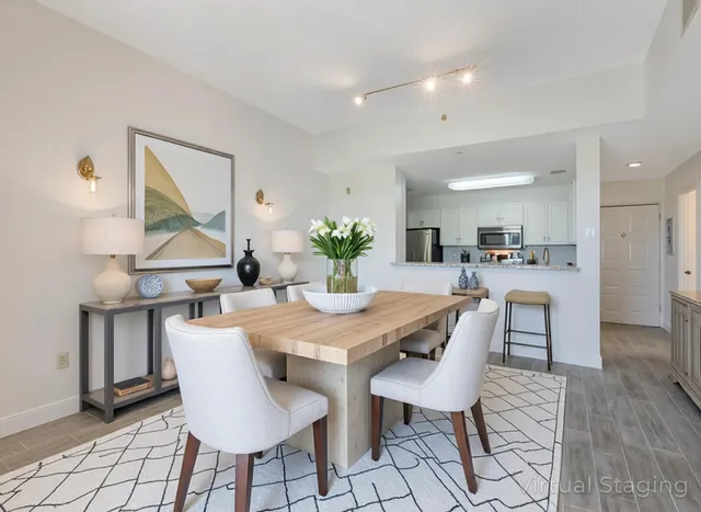 a view of a dining room with furniture