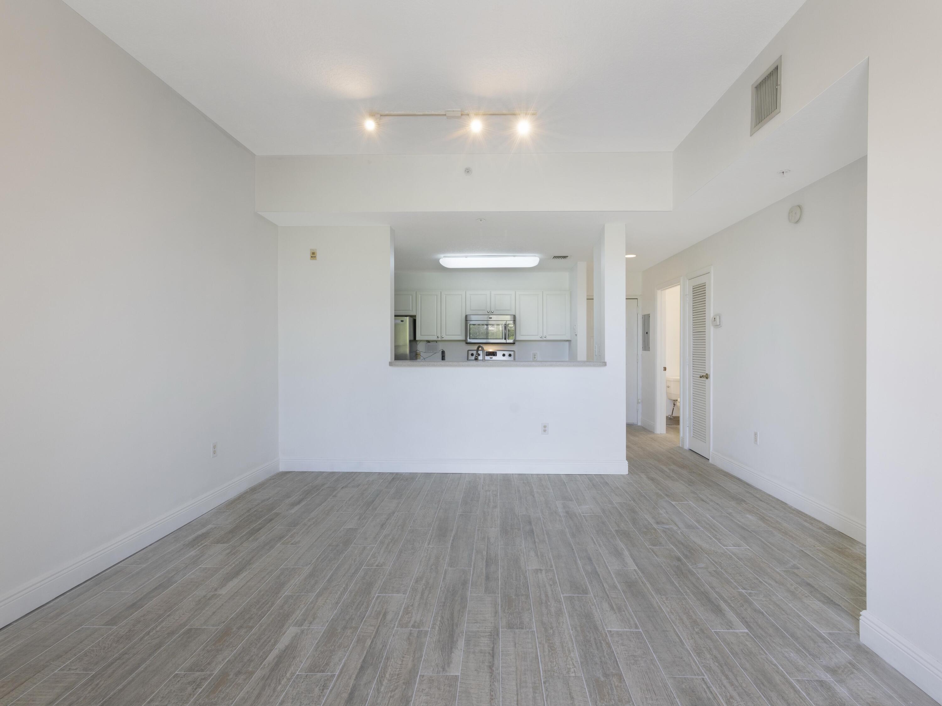 1155 Main Street, Unit 309 Jupiter, FL 33458 - Photo 19 of 35 Living Dining