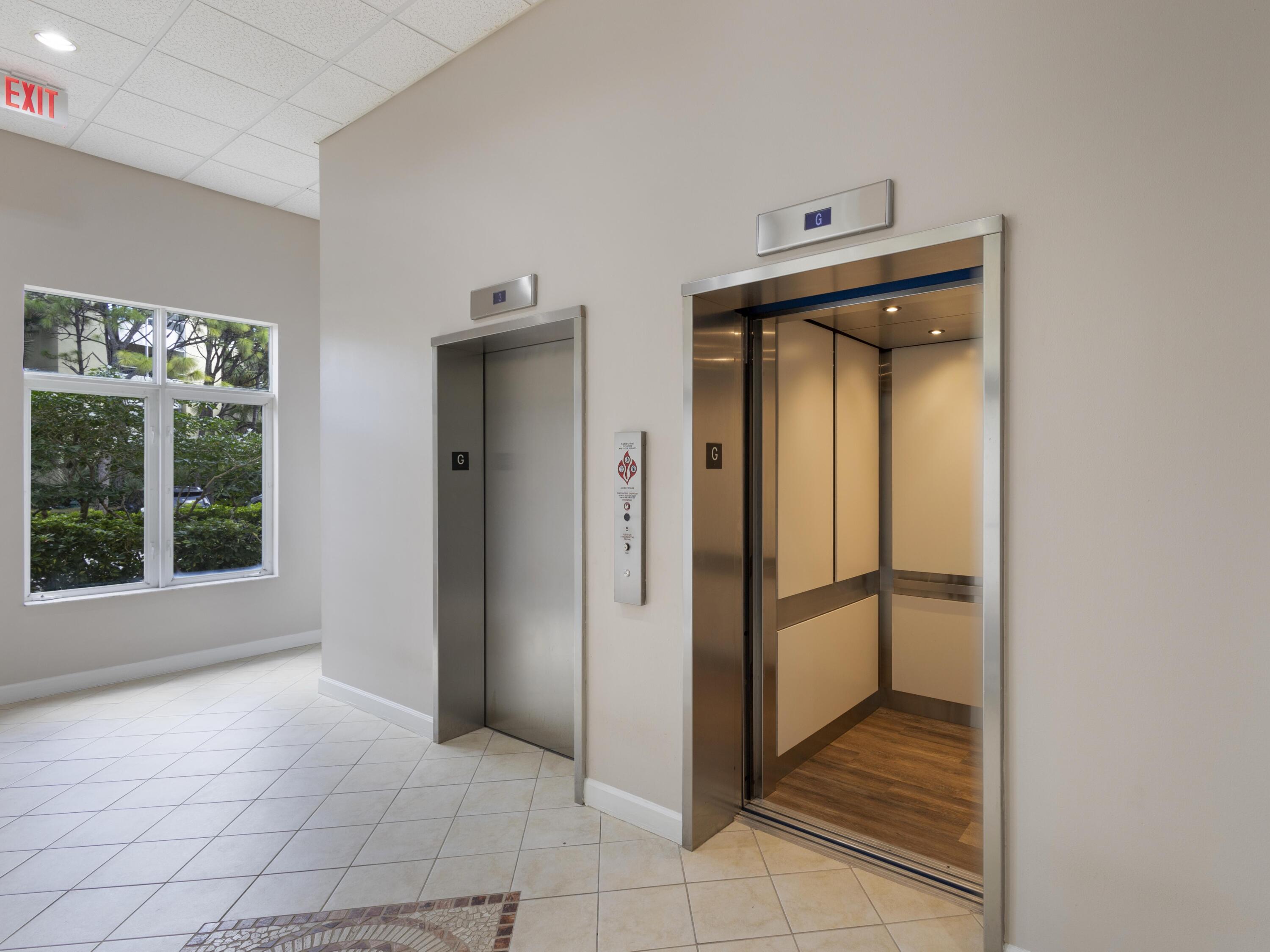 1155 Main Street, Unit 309 Jupiter, FL 33458 - Photo 22 of 35 Lobby Elevators