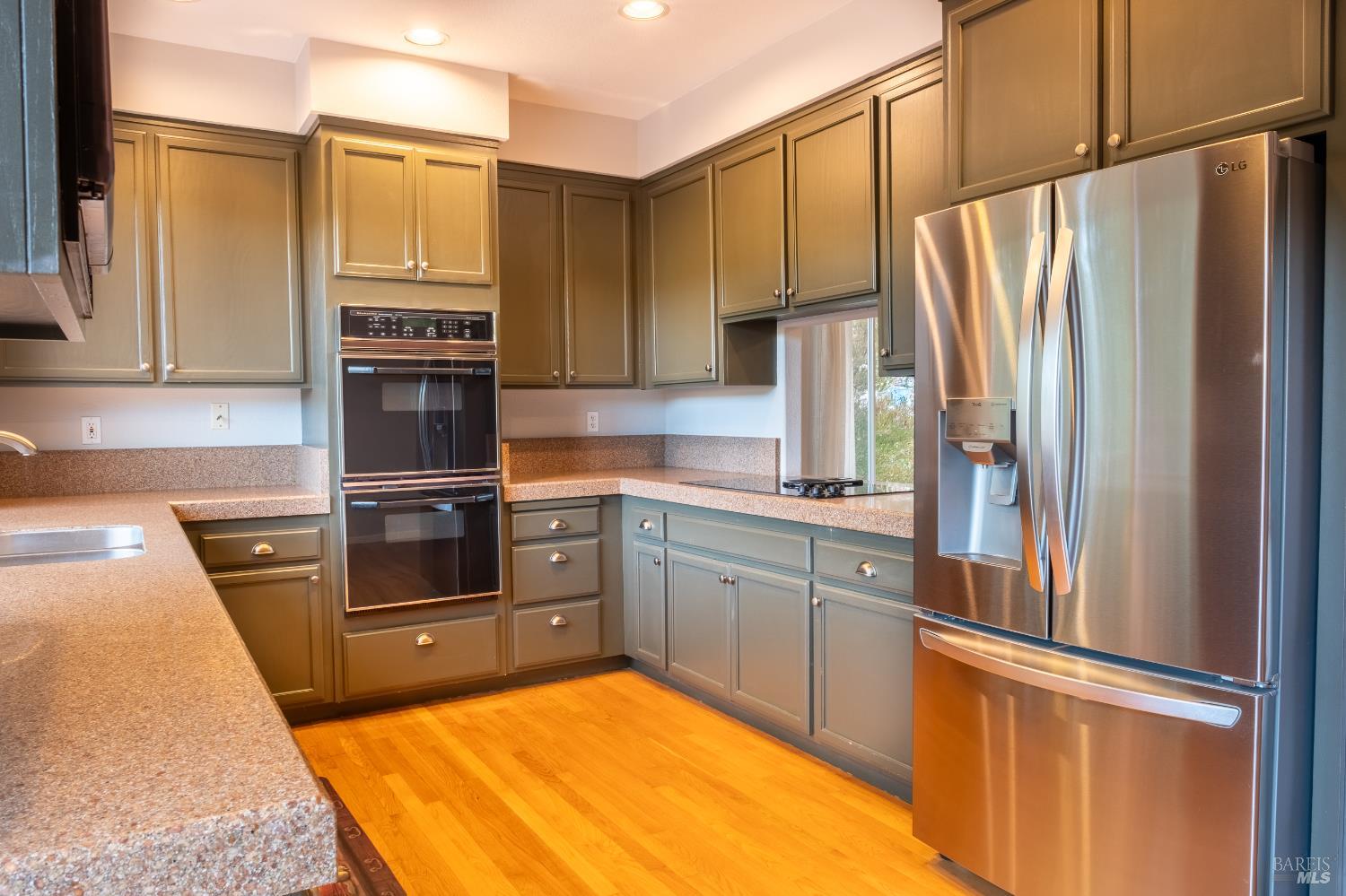 6261 Meadowstone Drive Santa Rosa, CA 95409 - Photo 15 of 21 a kitchen with stainless steel appliances a refrigerator sink and microwave
