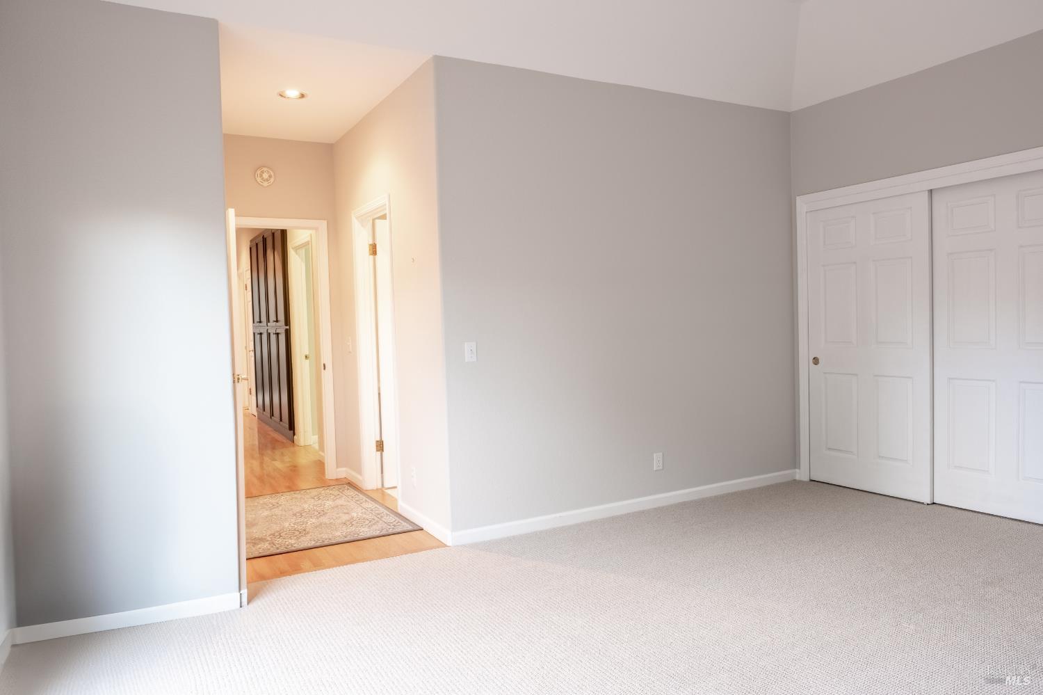 6261 Meadowstone Drive Santa Rosa, CA 95409 - Photo 5 of 21 an empty room with wooden floor and windows