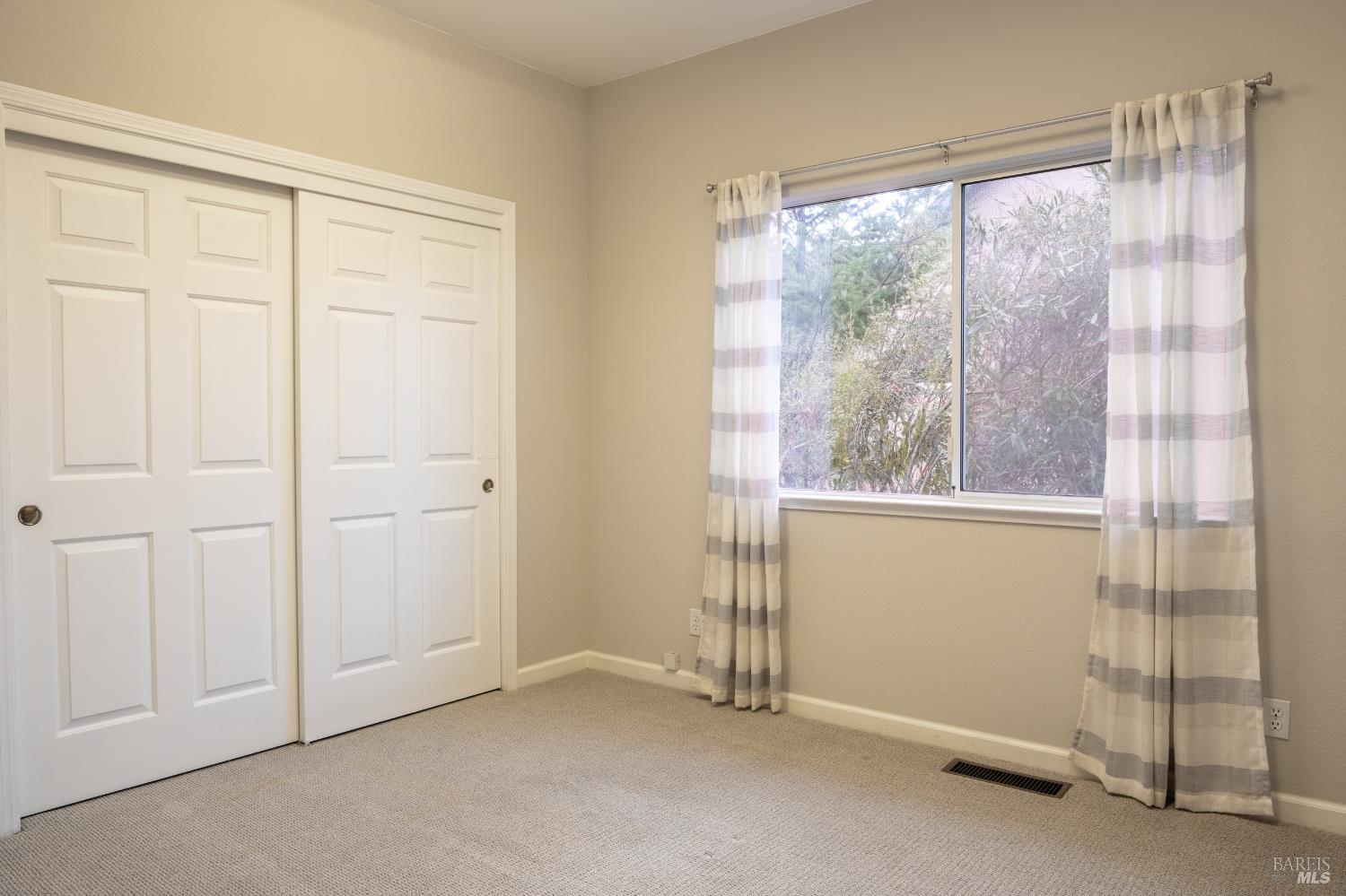 6261 Meadowstone Drive Santa Rosa, CA 95409 - Photo 9 of 21 a view of an empty room with a window