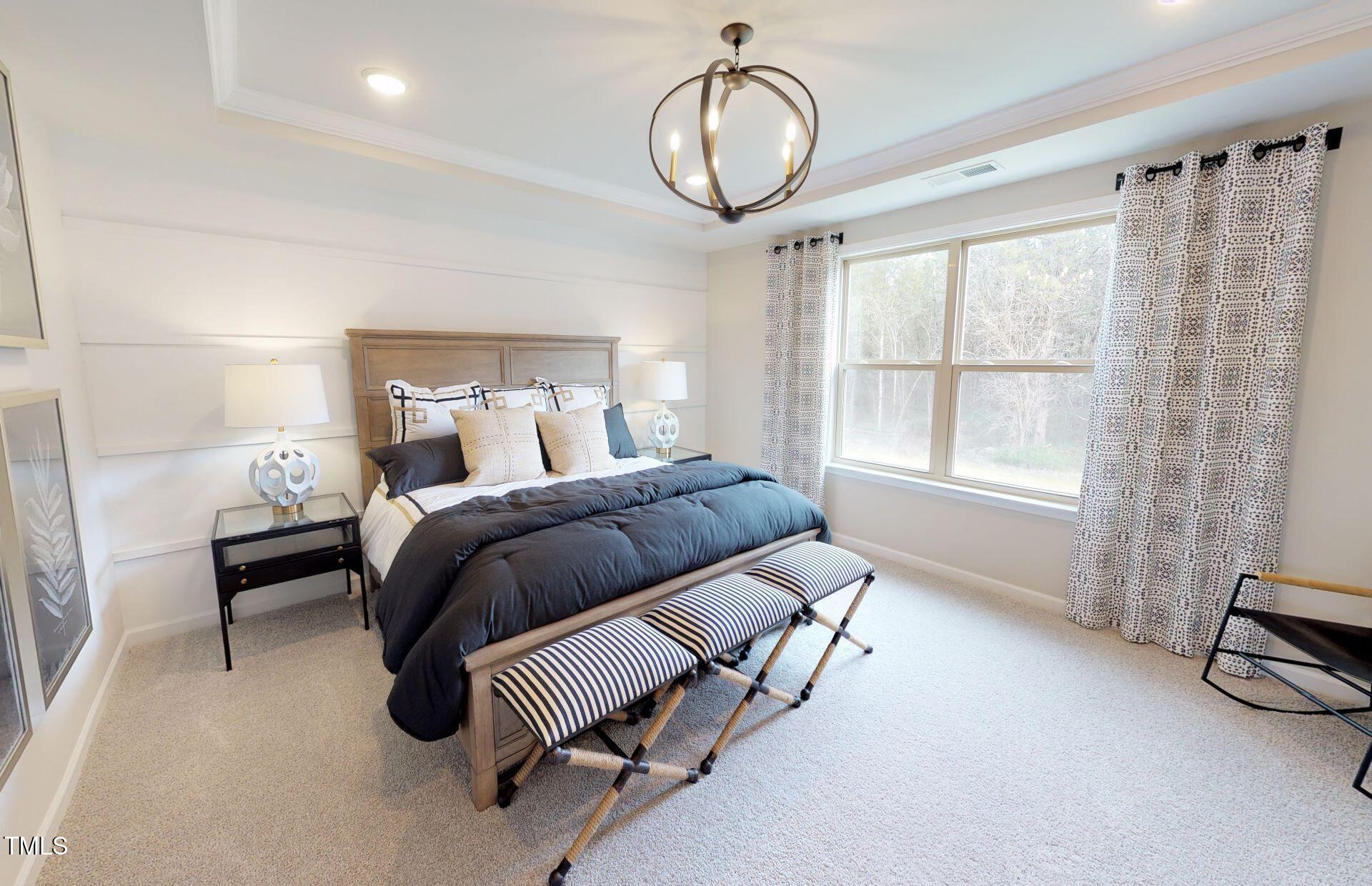 1105 Freestone Road Durham, NC 27703 - Photo 10 of 21 a bedroom with a bed and a window