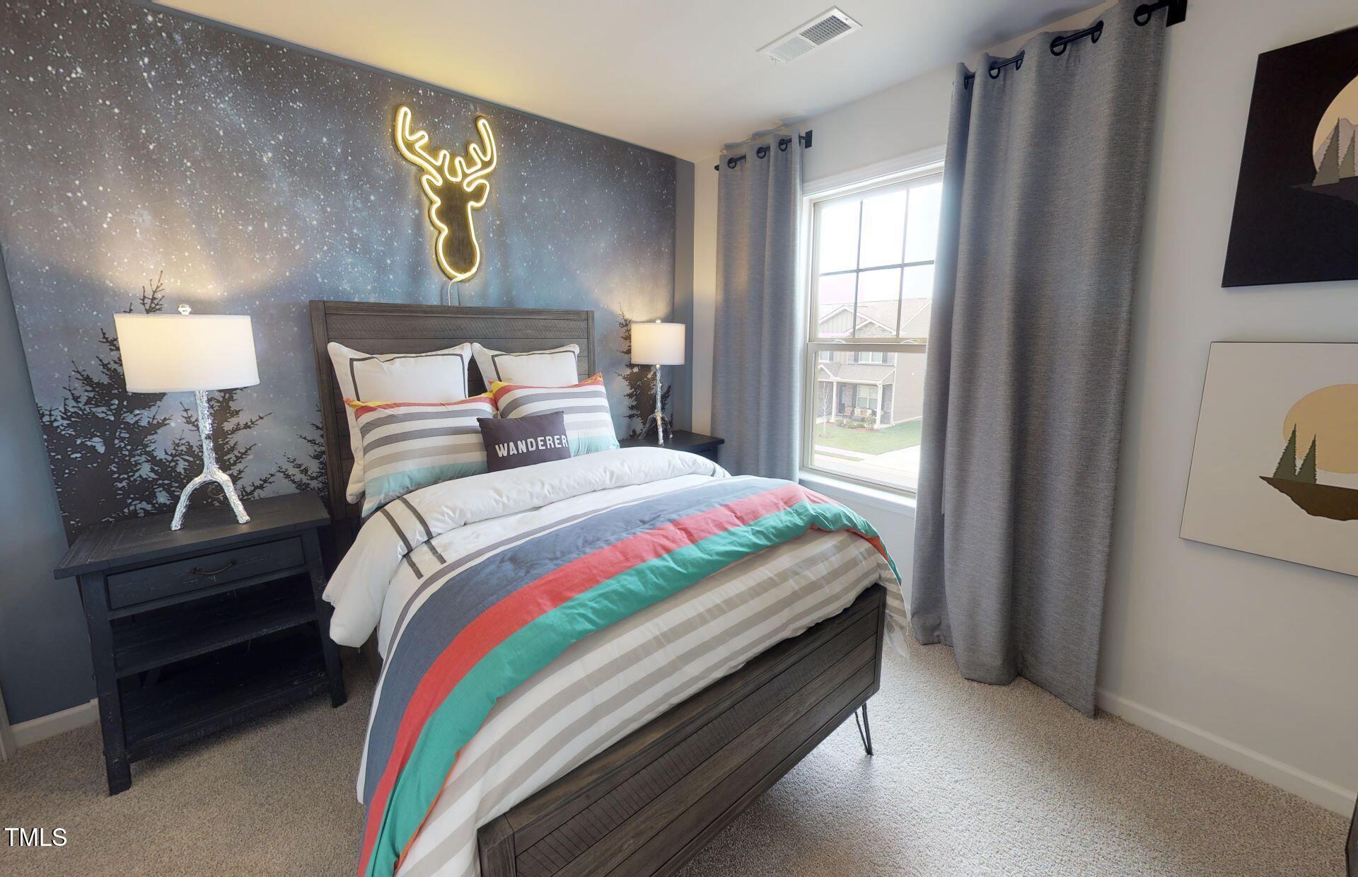 1105 Freestone Road Durham, NC 27703 - Photo 16 of 21 a bedroom with bed and a window