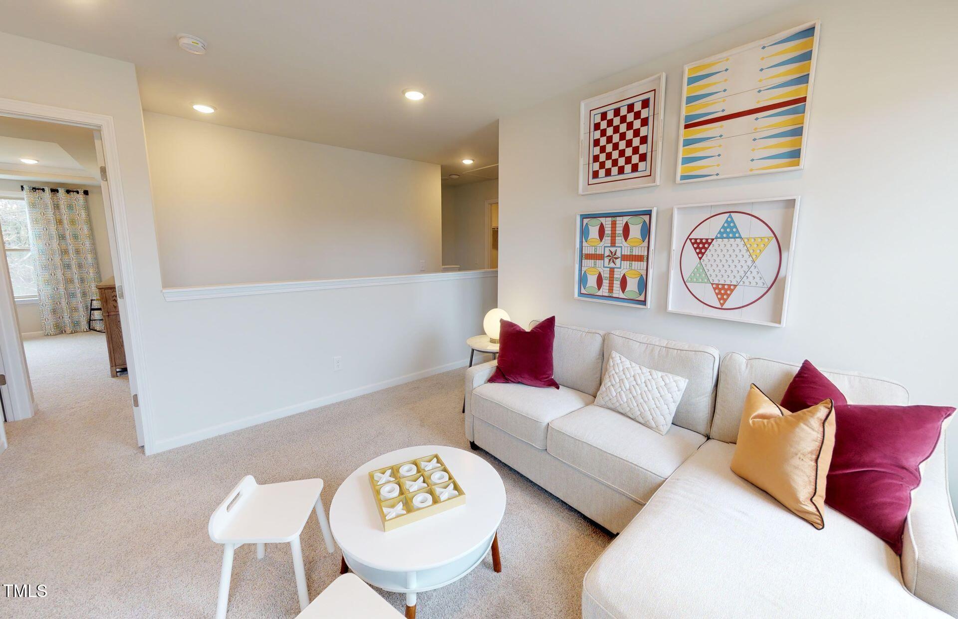 1105 Freestone Road Durham, NC 27703 - Photo 20 of 21 a living room with furniture and a table
